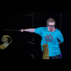 High level sword practitioner completes tatami cut
